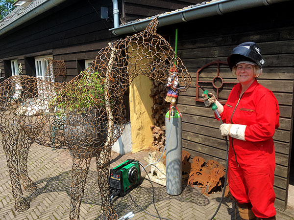 Anneke and her live size welded horse. trap